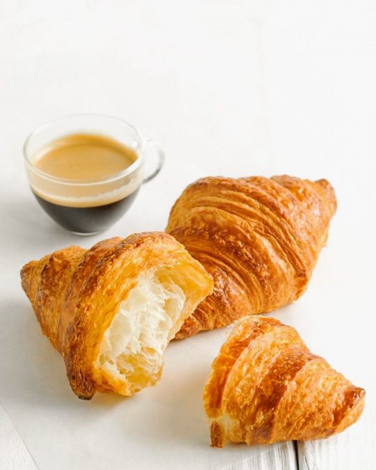 Maison Kayser's freshly baked croissants and black coffee