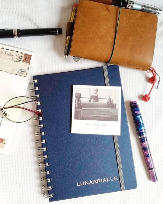 a blue personalised leather notebook from Bynd Artisan
