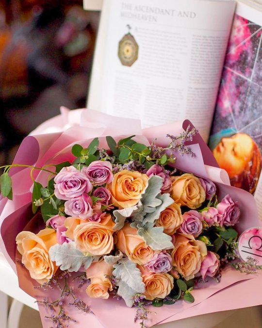 a beautiful bouquet of pick and orange roses from XpressFlower