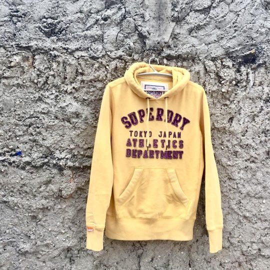 a vintage yellow hoodie from Superdry