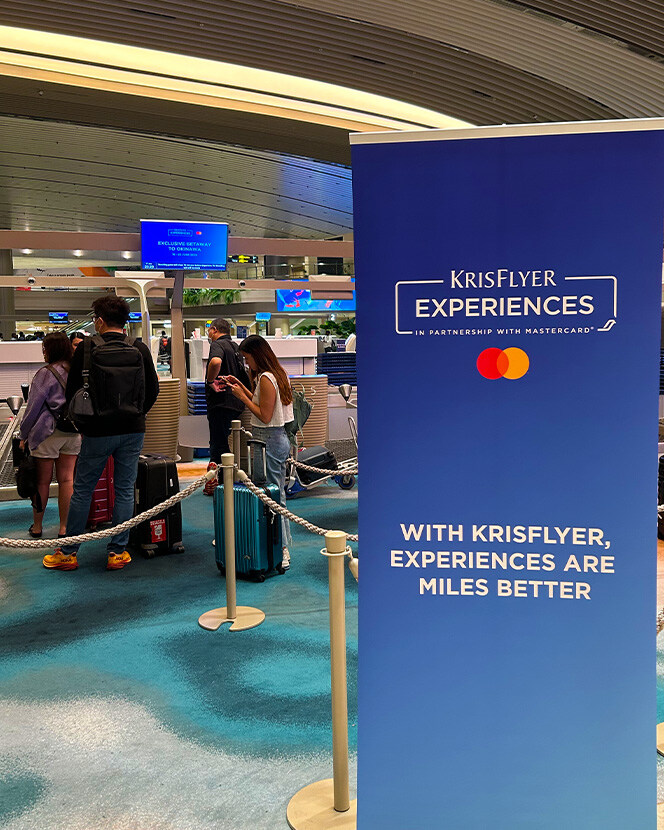 KrisFlyer members queuing to check in at the dedicated check-in lane